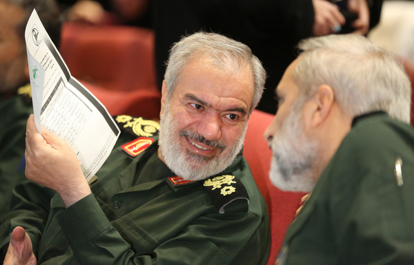 Deputy IRGC chief Ali Fadavi speaks to another member of the military during Basij Week in Tehran on November 24th. [Atta Kenare/AFP] 