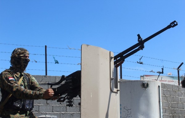 Un membre des forces de sécurité yéménites sécurise une zone dans la ville d'Aden, dans le sud du pays, le 9 décembre 2019. [Saleh al-Obeidi/AFP]