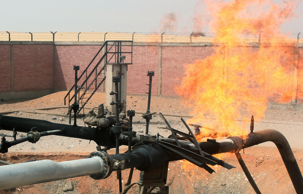 Flames shoot into the sky from a gas pipeline after unknown saboteurs bombed an Egyptian pipeline near the North Sinai village of al-Sabil in this file photo from April 27th, 2011. [AFP PHOTO/STR]