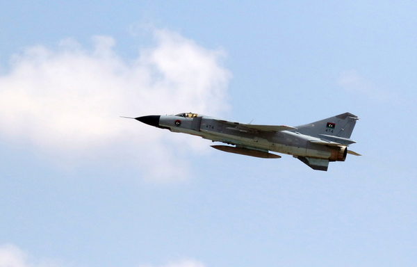 This photo taken on September 4th, 2016 in the coastal city of Misrata shows a MIG-23 fighter jet of the Libyan Air Force taking off from the Air College airbase. [Mahmud Turkia/AFP]