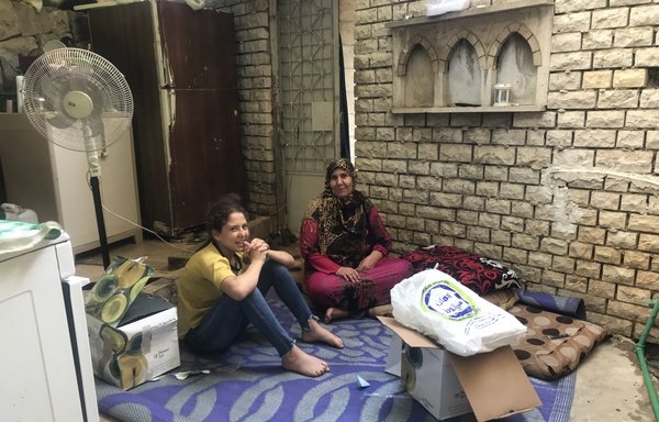 La réfugiée syrienne Fida Moufdel Khudr est revenue avec ses enfants dans son village près de Homs après huit ans passés au Liban. [Nohad Topalian/Al-Mashareq]