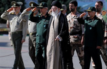 Lacking gravitas, religious credentials, Khamenei uses IRGC to hold power
