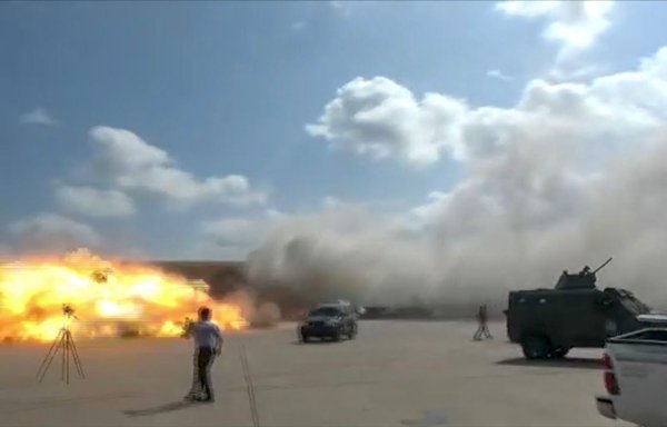 A video grab shows the moment an ordnance hit the airport in the southern Yemeni port city of Aden on December 30, 2020, shortly after the arrival of a plane carrying members of a new unity government. [AFPTV/AFP]