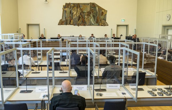 Joint plaintiffs are seen at the courtroom prior to the start of a trial against two Syrian defendants accused of state-sponsored torture in Syria on April 23 in Koblenz, Germany. Two alleged former Syrian intelligence officers were accused of crimes against humanity in the first court case worldwide over state-sponsored torture by the Syrian regime. [Thomas Lohnes/POOL/AFP]