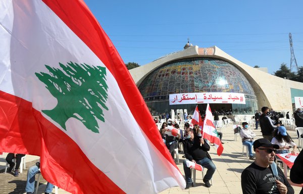 Lebanese protesters gather for the speech of Maronite Patriarch Beshara Boutros al-Rahi on February 27 at the Maronite Patriarchate in the mountain village of Bkerki. Al-Rahi has called for a UN-sponsored international conference on Lebanon. [Anwar Amro/AFP]