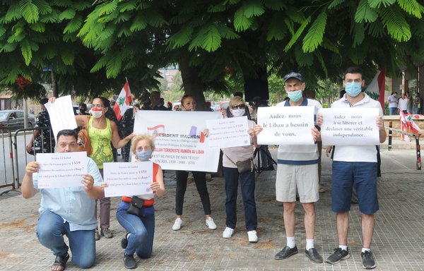 Lebanese demonstrators gather in Beirut on July 14 to urge France and the international community to fully implement UNSCR 1559. [Ziyad Hatem/Al-Mashareq]