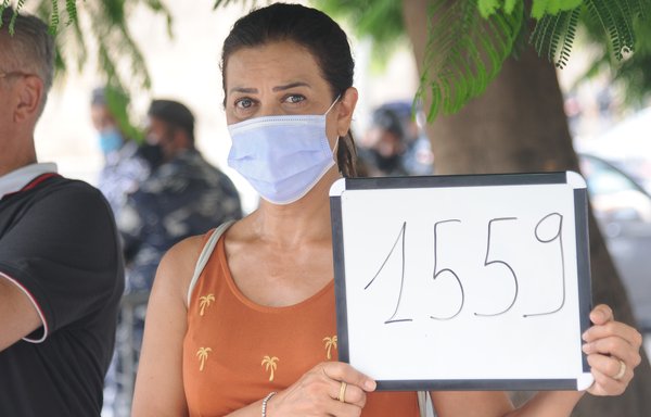 تجمع لمتظاهرين لبنانيين في بيروت بتاريخ 14 تموز/يوليو لمطالبة فرنسا والمجتمع الدولي بالتنفيذ الكامل لقرار مجلس الأمن رقم 1559. [زياد حاتم/المشارق]