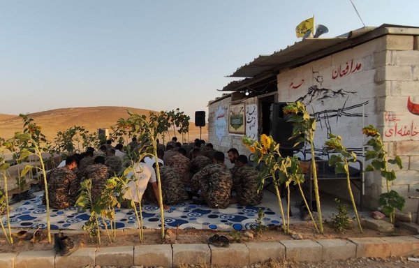 Members of the Fatemiyoun Division are shown at a site in Syria's eastern desert where tunnels are being dug. [Fatemiyoun Telegram account]