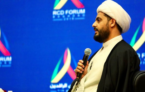 Asaib Ahl al-Haq militia leader Qais al-Khazaali is seen during a forum held by the Al-Rafidain Centre for Dialogue on February 21, 2019. [Al-Rafidain Centre for Dialogue]