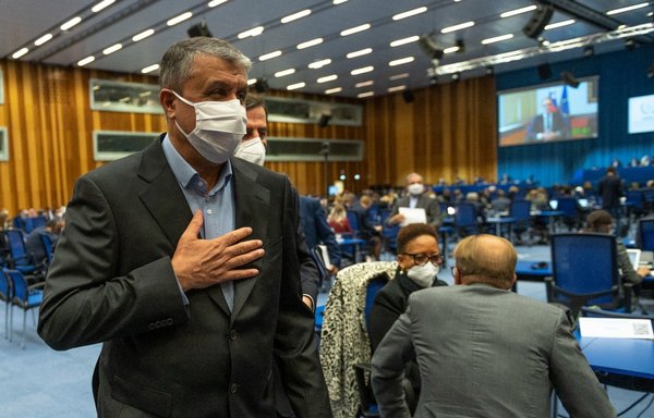 Head of Atomic Energy Organisation of Iran Mohammad Eslami departs from the International Atomic Energy Agency general conference, an annual meeting of all IAEA member states, at the agency's headquarters in Vienna, Austria on September 20. [Joe Klamar/AFP]