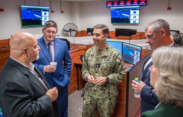 US Navy, State Department and Drug Enforcement Agency leaders attend a December 8 ribbon-cutting ceremony at Naval Support Activity Bahrain for a new facility that will enable interagency partners to share information for countering drug trafficking. [US Navy]