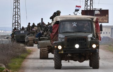 Iran-backed militias, Syrian forces seize private homes in Daraya