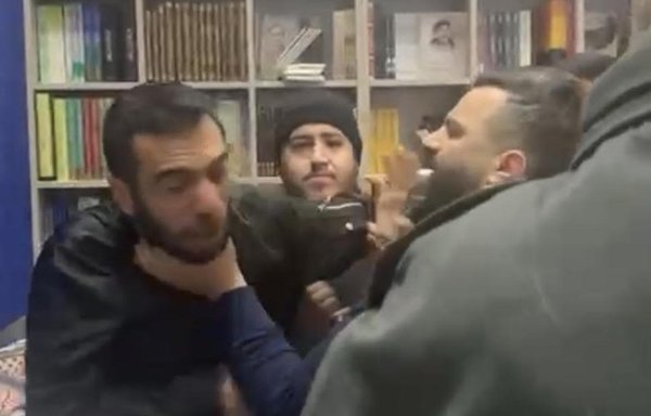 Lebanese activist Shafiq Badr was beaten at the Beirut Arab book fair after he criticised the erection of a giant portrait of slain IRGC commander Qassem Soleimani next to the Iran pavilion. [Video screenshot]