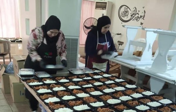 Women with the charitable organisation Sawa Mninjah in Tripoli prepare daily iftar meals consisting of soup, salad, a main meat dish, juice, bread and sweets. [Sawa Mninjah]