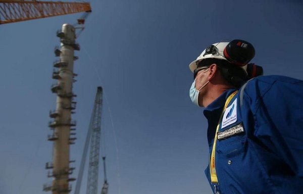 An Iraqi engineer monitors a gas investment project in Basra on June 29. Iraq is seeking to reduce its imports of Iranian gas. [Iraqi Ministry of Oil]