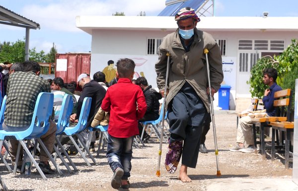 An Afghan deportee is seen April 19 at a United Nations refugee camp in Herat city after he was tortured by Iranian authorities. [Emran]