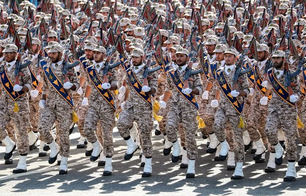 Members of Iran's IRGC march during a military parade in the capital Tehran on September 22, 2018. [AFP]