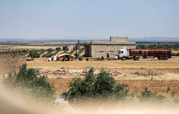 This picture taken on June 16 shows a view of a building where US-led international coalition forces conducted an overnight airborne operation in the village of Humaira in Syria's Aleppo province, where they captured a senior ISIS bomb maker. [Bakr Alkasem/AFP]