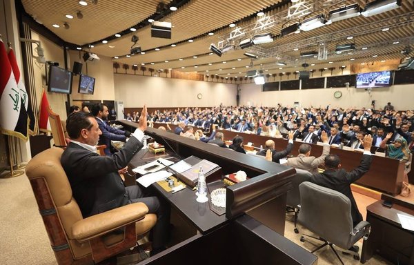 A photo shows Iraqi Parliament members before lawmakers of the Sadrist bloc had resigned. [Iraqi Parliament]