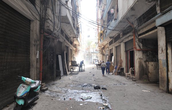 Lebanon's economic and political crises have cast a shadow over Tripoli. Most small shops have closed their doors, as evident in this photo of a side street off Syria Street in Bab al-Tabbaneh. [Ziad Hatem/Al-Mashareq]