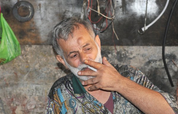 Mohammed Khaled al-Sayed was forced to close down his furniture painting business in Tripoli a year ago, amid Lebanon's ongoing crisis. [Ziad Hatem/Al-Mashareq]