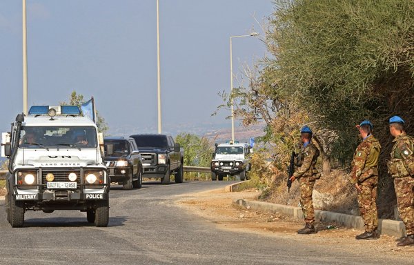 A convoy of vehicles arrives at Lebanon's southern town of Naqoura on October 27 to deliver to the UN the letter that was signed separately by President Michel Aoun about the US-brokered maritime border deal between Lebanon and Israel. [Mahmoud Zayyat/AFP]