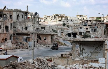 Syrian army burned corpses to hide victims' identities and destroy evidence of its crimes