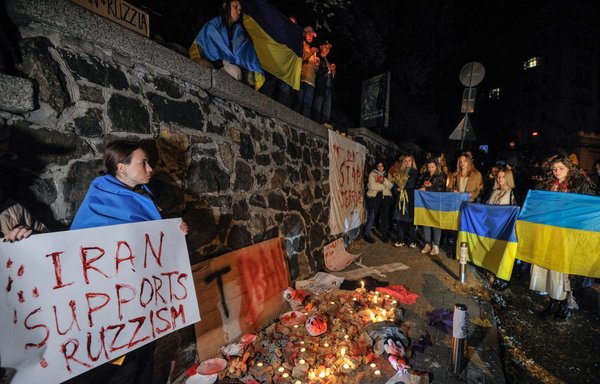 Protesters demonstrate outside the Iranian embassy in Kyiv, Ukraine on October 17, after the city was hit by swarms of kamikaze drones sold by Iran to Russia, leaving at least three dead. [Sergei Chuzavkov/AFP]