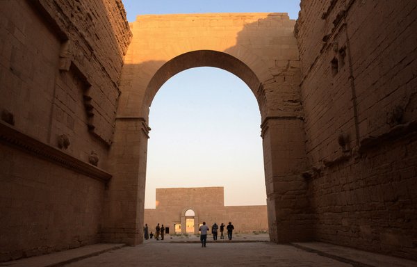 A group of tourists visit the ancient city of Hatra on September 10. [Zaid al-Obeidi/AFP]
