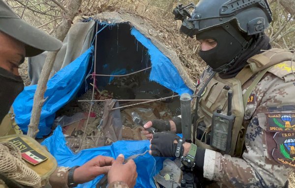 Two Iraqi soldiers inspect an ISIS hideout during a security operation launched in the north of the country on November 12. [Counter-Terrorism Service]