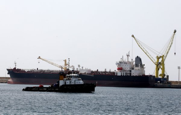 The Iran-flagged oil tanker Clavel is docked at Shahid Beheshti Port in the southeastern Iranian coastal city of Chabahar, on the Gulf of Oman, during an inauguration ceremony of new equipment and infrastructure at the port on February 25, 2019. [Atta Kenare/AFP]
