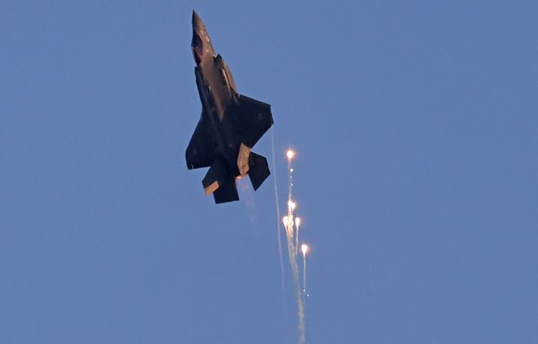 Israel's F-35 Lightning II fighter jet takes part in an aerial display during a graduation ceremony of Israeli Air Force pilots at the Hatzerim base in the Negev desert, near the southern city of Beer Sheva, on June 23. [Menahem Kahana/AFP]
