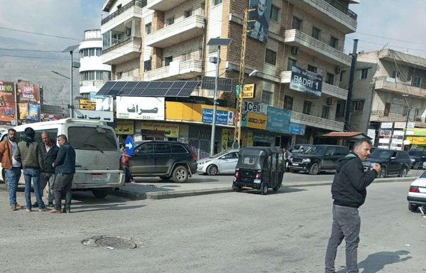Currency exchange shops line a square in the Bekaa Valley town of Chtoura. [Al-Mashareq]