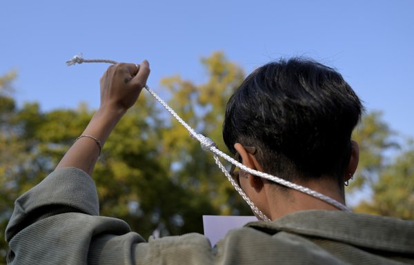 A youth takes part in a protest to demand human rights in Iran outside the Iranian embassy in Mexico City on December 19. [Pedro Pardo/AFP]