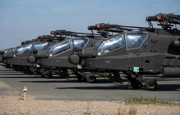US Army AH-64 Apaches sit on the flight line at Ali Al Salem Air Base in Kuwait on February 10. [US Air Force]