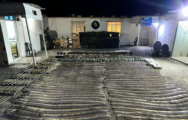 Iraqi security forces display weapons seized in Anbar during a successful operation against ISIS on April 21. [CENTCOM]